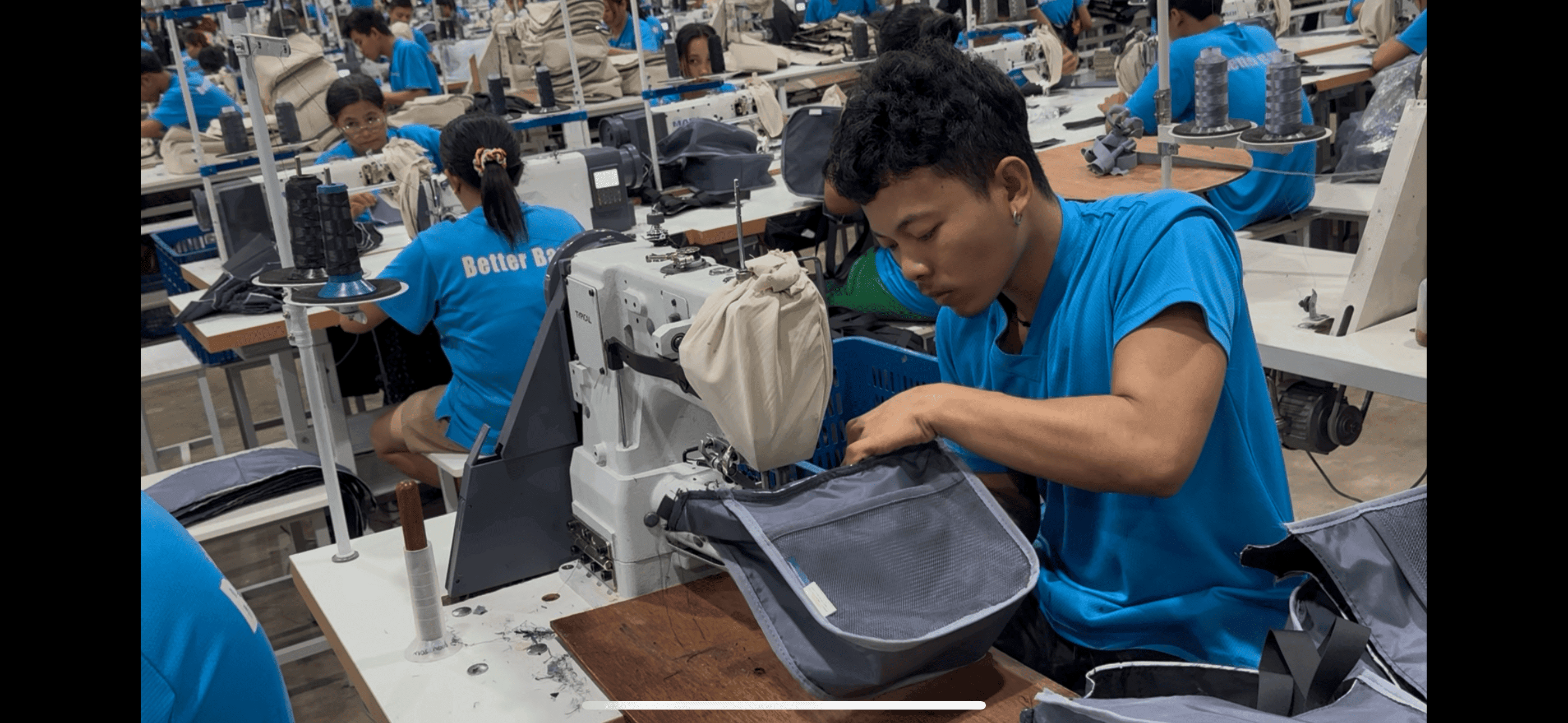 The side-pocket section of a backpack, sewn while checking one stitch at a time.